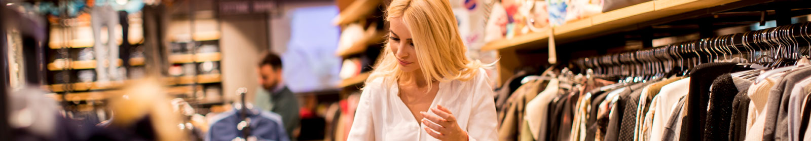 Woman shopping in clothing store